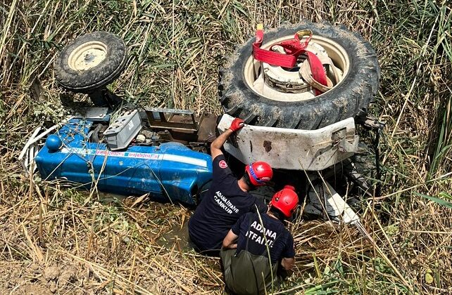 TRAKTÖRÜN ALTINDA KALDI